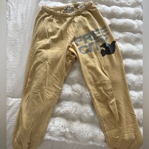 freecity Women’s Yellow Joggers with Gray Logo